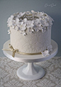More flocked lace with white on cream loveliness cake
