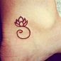 The lotus in Buddhism is a symbol for prosperity as they literally rise above the muck and blossom