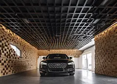 AI绘画_Prompts_NINITAN_a_black_car_in_a_garage_with_a_wood_ceiling_in_the_styl_baddc4aa-db7e-4aa4-849c-4c3aff4eafe3_xpanx.com