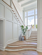 Example of a beach style staircase design in Charlotte