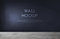 Empty room with a black wall mockup Free Psd