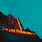 Low Angle Photography of Brown Building With Los Angeles Led Sign