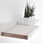 Invisible shelf WOUPS : A beautiful harmony of materials, texturesand colors for the shelf WOUPS that mixesnatural ash wood with lacquered metal.