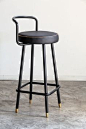 The idea behind the Block stool was to create something very simple without rough edges and with a non tiring aesthetic for the user. The difference of the Block B A stool is the finishing of the legs in polished brazen and the metal armrest....