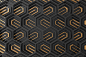 Black and gold tridimensional background Premium Photo