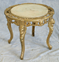 Cast iron low table with white marble insert, the borde