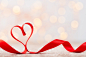 Red heart with ribbon. valentines day background. Premium Photo