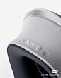 an electronic device with buttons on the front and side of it's speaker system