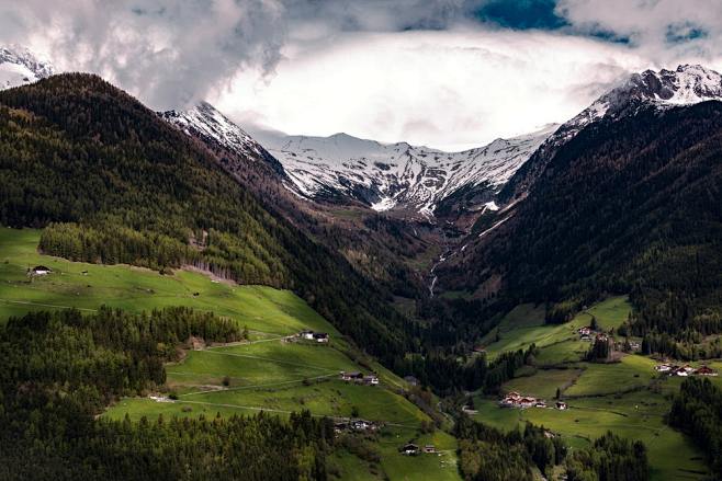 a village in a deep mountain valley in zillertal alps