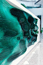 Reception Desk Made by Stacking Layers of Glass