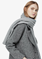 100% cashmere scarf/bouclé wool coat: Mango