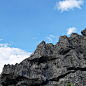 Free photo mountain peak with blue sky