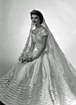 Jacqueline Kennedy in her wedding dress, 1953.