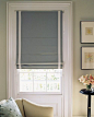 colored roman shade with white embellishment.  time to get serious about some window coverings.: