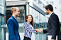 Business people handshake outdoor by Milenko Đilas on 500px