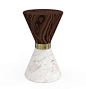 The Vinicious stool is a perfect example of duality. The white marble functions perfectly in   contrast with the black marble and the golden brass detail in the middle.: 