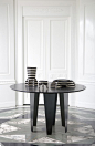 KELLY WEARSTLER | GRAFTON TABLE. Blackened steel base paired with a Negro Marquina marble top