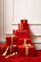 In this illustration, red boxes with ribbon on top of them, in the style of large-scale photography, elegant compositions, carpetpunk, xmaspunk, minimalist still lifes, light white and gold, lively interiors