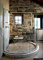 curved glass shower walls? And .... STONE walls ...