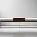 Arik Levy’s Argon bench in walnut and leather with polished stainless-steel legs.