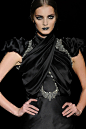 What a Braavosi noble woman would wear, Hannibal Laguna
In Braavos black is a colour reserved solely for the nobility, the smallfolk and braavos wear flamboyant colours.