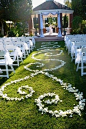 Form an aisle runner out of rose petals. | 31 Impossibly Romantic Wedding Ideas