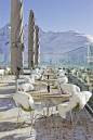 Hotel Muottas Muragl in the Swiss Alps...how amazing....I want to go there just to sit in those chairs!!!