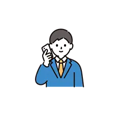 スマホで電話をする男子学生