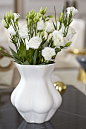Jonathan Adler - Kiki's Derriere Vase. A feminine piece of porcelain that she can store her flowers in.