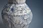 Readymade Cross-Stitch and Floral Motifs Are Embroidered Directly into Porcelain Vases : Caroline Harrius merges two historically domestic crafts in her florally embroidered vases. The Stockholm-based artist shapes tall vessels and studs them with tiny ho