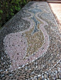 Mosaic pebble path at Lotus Land