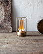 Close up of Turn+ portable lantern in brass