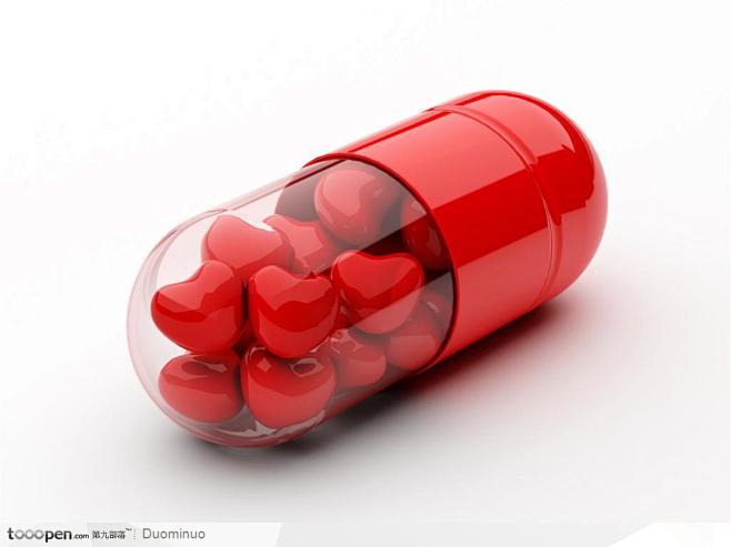 大红色心形药丸图片素材，三维立体3D效果...