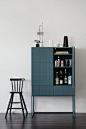 teal blue cabinet used as bar storage. / sfgirlbybay