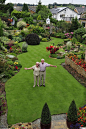 A Gardening Life: They spend 30hrs a week gardening!! - Anne and Stuart Grindle stand on the hallowed turf, proudly showing off their immaculate garden at their home in Rotherham, Yorkshire.