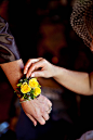 Wrist corsage - yellow sweetheart roses.