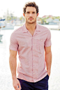 red/white textured shirt. navy shorts. boat shoes. simple. southern. summer. style.: 