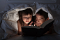 Kids reading in the dark