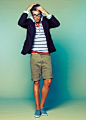 Shop this look for $138:  http://lookastic.com/men/looks/shorts-and-plimsolls-and-v-neck-t-shirt-and-hoodie-and-jacket/693  — Olive Shorts  — Light Blue Plimsolls  — Red V-neck T-shirt  — White and Navy Horizontal Striped Hoodie  — Navy Jacket