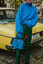 H&M cashmere baby blue oversized sweater, green high waisted trousers, patent heeled ankle boots, black leather ankle booties, how to wear green and blue in fall, prada borsa a mano saffiano lux cobalt bag, mini tote bag, prada blue bag, news boy cap,