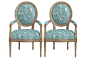 Capri Leaves Liam Armchairs, Pair : Crafted with a fluted maple frame, blue-and-white leaf pattern, and matching manchettes, this set of traditional side chairs is stylish, versatile, and built to last.