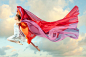 Caucasian woman floating through air with scarves by Gable Denims on 500px