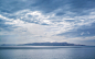 panoramic-photography-of-glacier-mountain-below-white-clouds-813847