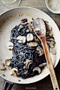 Squid ink spaghetti with porcini mushrooms