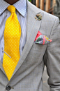 I like the contrast of the yellow and the print of the pocket square