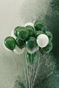 green and white balloons