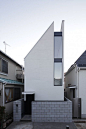 A small three-story house is built on a 40m2 lot: