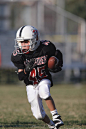 Boy Playing Football