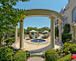 French Formal Luxury : Magnificent French Formal Estate in Dallas, Texas featuring limestone, balustrade, tile pool, bluestone, negative edge pool, boxwood parterre, fountains and pavestone driveways. Architecture by Fusch