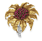 A RUBY, DIAMOND AND GOLD BROOCH, BY CARTIER   Designed as a flower, set with a circular-cut ruby cluster pistil, extending sculpted gold petals, to the circular-cut diamond stem, mounted in yellow and white gold  Signed Cartier, no. 8485